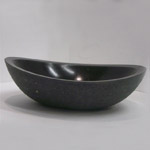 Solid sinks,  pieces made out of marble, granite or limestone