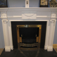 Carved Adam fireplace in white Sivec marble