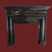 The Bolection surround in noir st. laurent marble, polished