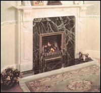 The Panelled Corbel Fireplace out of White Estremoz Marble.