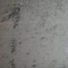 White Carrara marble, polished finish.