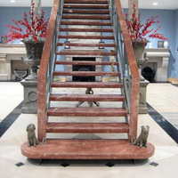 Staircase, treads and copings in Red Alicante marble