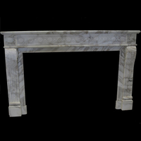The Limoges Fireplace in calacata gold marble