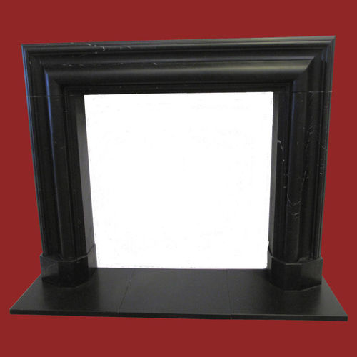 The Bolection mould fireplace in black marble