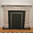 The Adam Fireplace out of Light Estremoz Marble, Honed Finish.