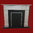 The Adam Fireplace out of Light Estremoz Marble, Honed Finish.