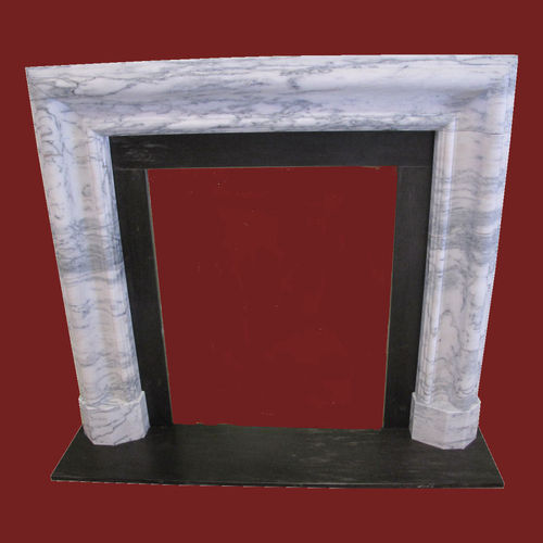 Bolection mould fireplace in white and grey marble