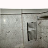 Bathroom cladding in arabescato marble