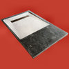 Solid shower tray in black ruivina marble, honed.